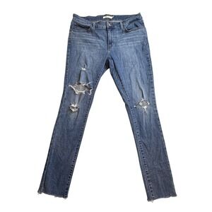 Levis 711 Skinny Jeans Womens 31 Medium Wash Blue Denim Ripped Knee‎ Raw Hem